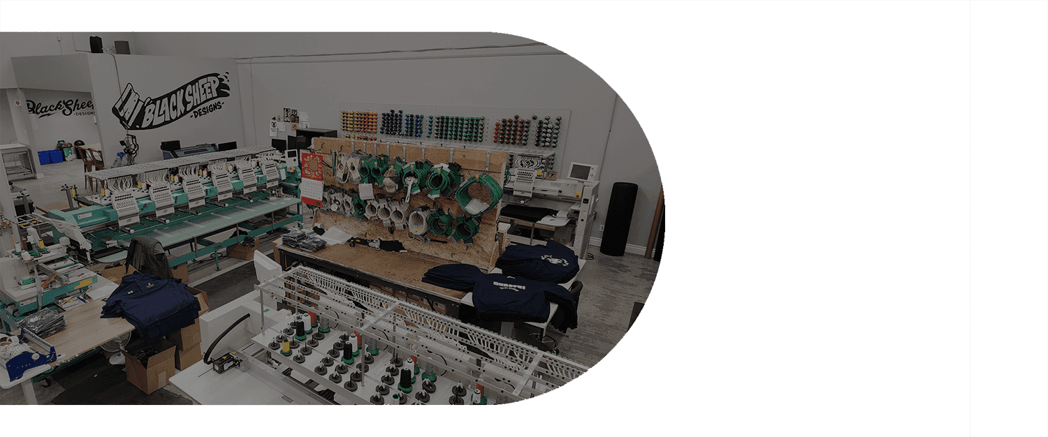 The Black Sheep Designs embroidery floor — multi-head machines and thread walls